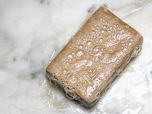 Can skin soap damage natural stone